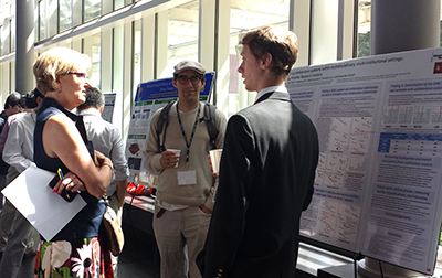 Dr. Elsa Reichmanis with students Jonah Bea-Taylor and Alexander Smith